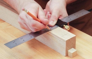 woodworking with tape measure, pencil and ruler